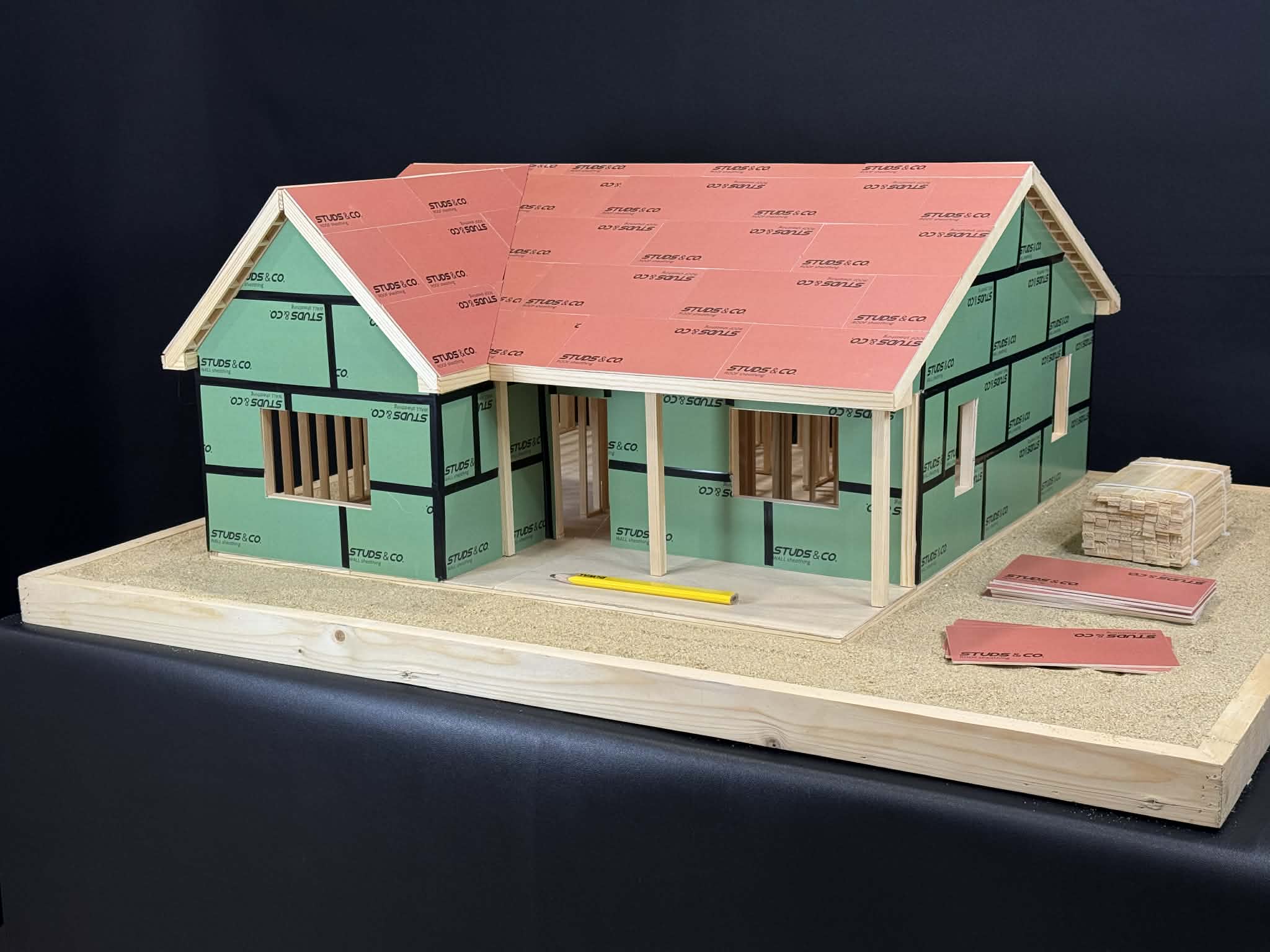 Miniature ranch house building stage